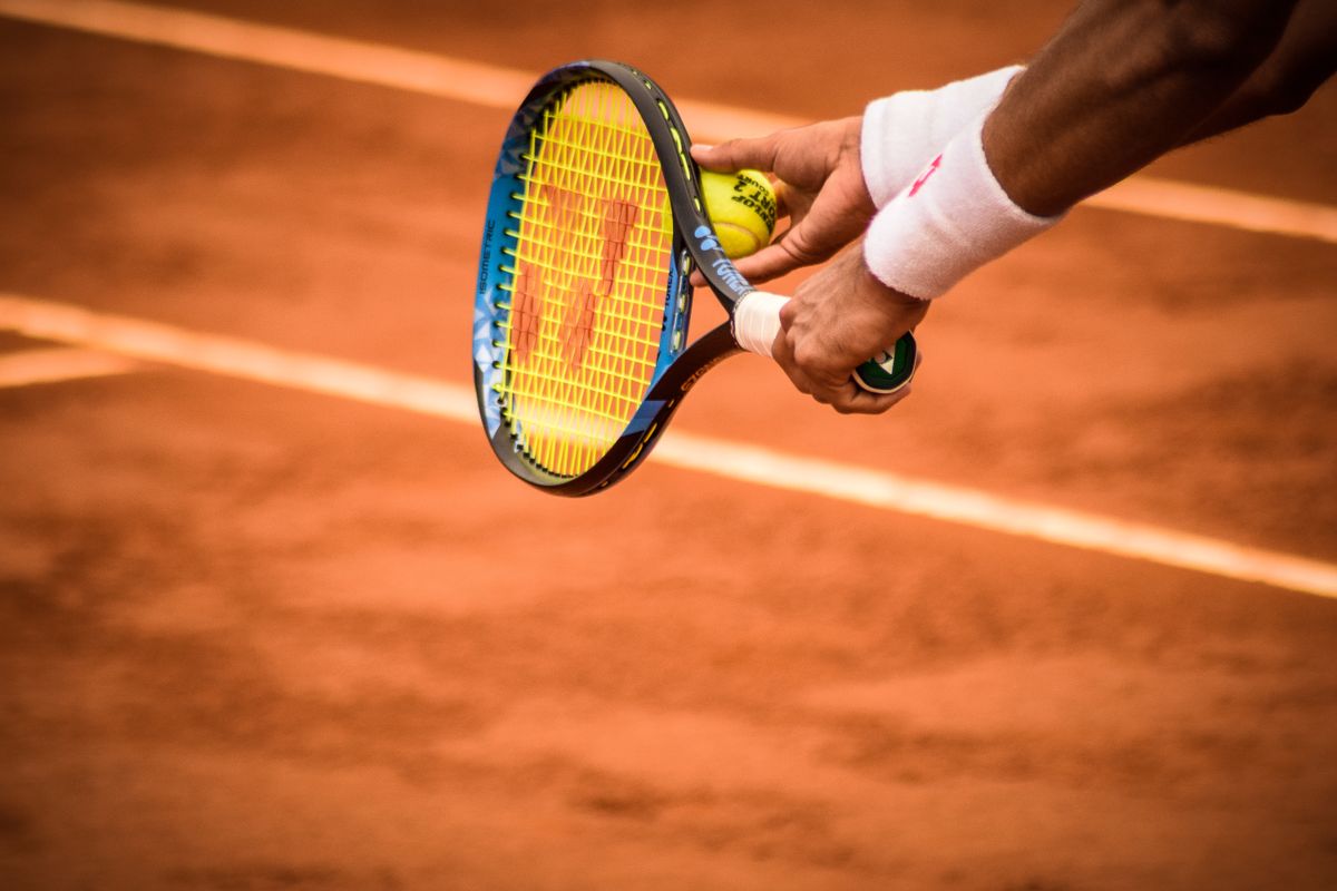Tennis player serving